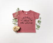 Stronger than the Storm Baby, Toddler & Youth Shirt - light or dark artwork